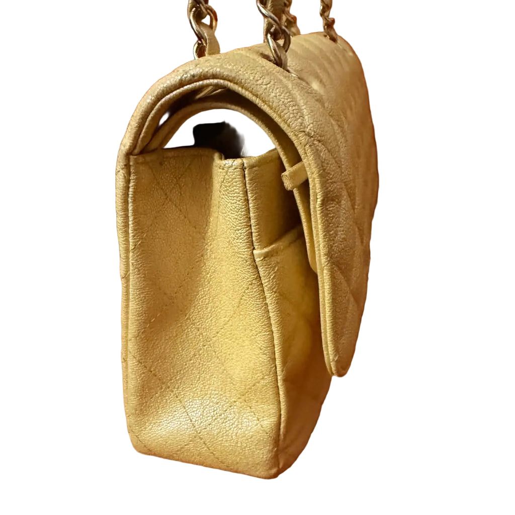 Chanel Classic Double Flap Bag finished in a vibrant yellow hue.