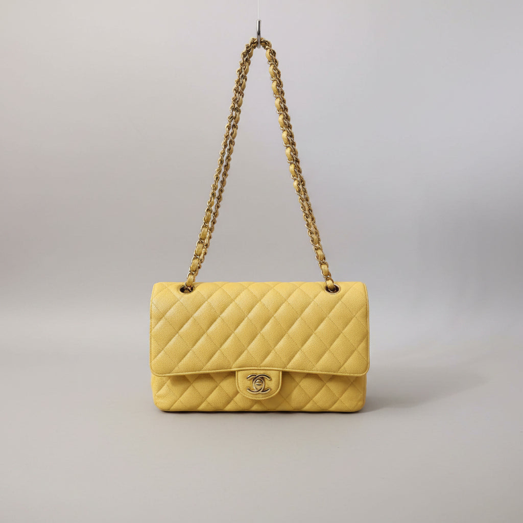 Chanel Classic Double Flap Bag finished in a vibrant yellow hue.