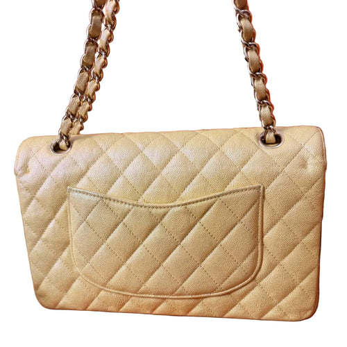 Chanel Classic Double Flap Bag finished in a vibrant yellow hue.